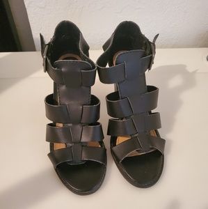 Report caged block heel